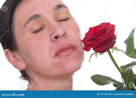 Close Up Face Of A Mature Woman With A Rose Stock Image Image Of Lady Portrait 197787125