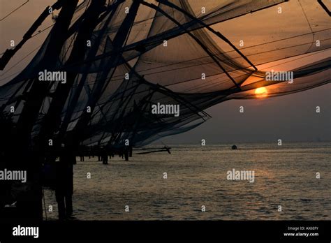 Chinese Fishing Nets At Sunset In Cochin India Stock Photo Alamy