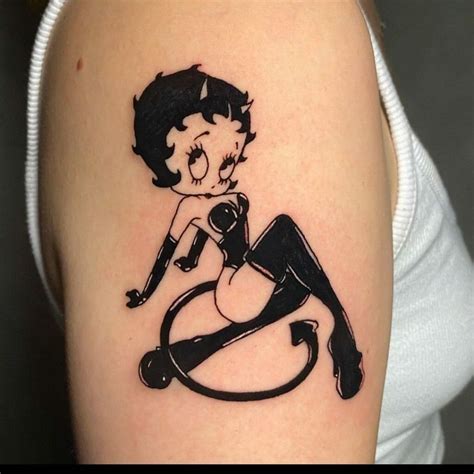 Adult Betty Boop Holding Pistols Tattoos Telegraph