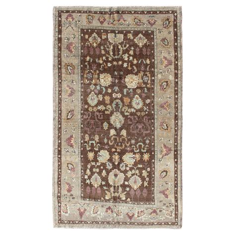 Turkish Oushak Rug With All Over Floral Design On A Light Brown Field