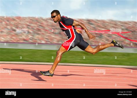 Sprinter Crossing Finish Line Hi Res Stock Photography And Images Alamy