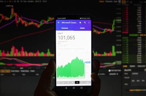 A smartphone displays the Microsoft Corporation market value - Creative ...
