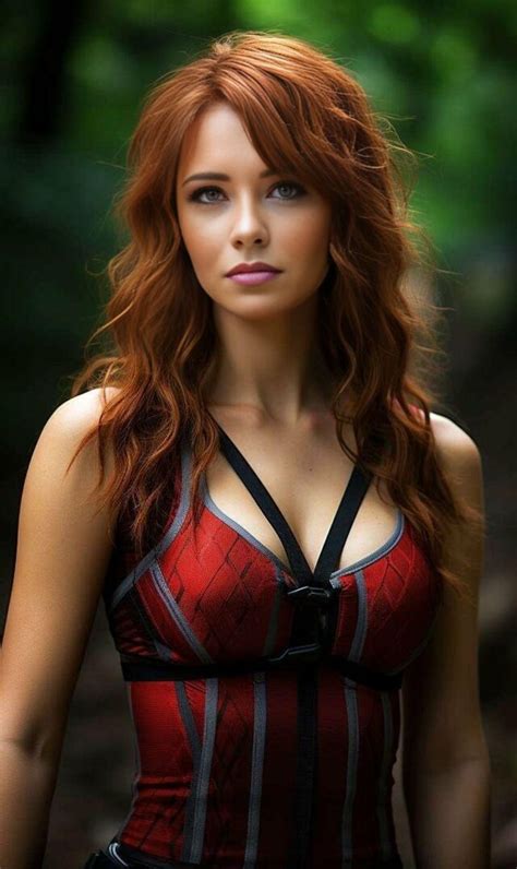 A Woman With Red Hair Wearing A Corset And Posing For A Photo In The Woods