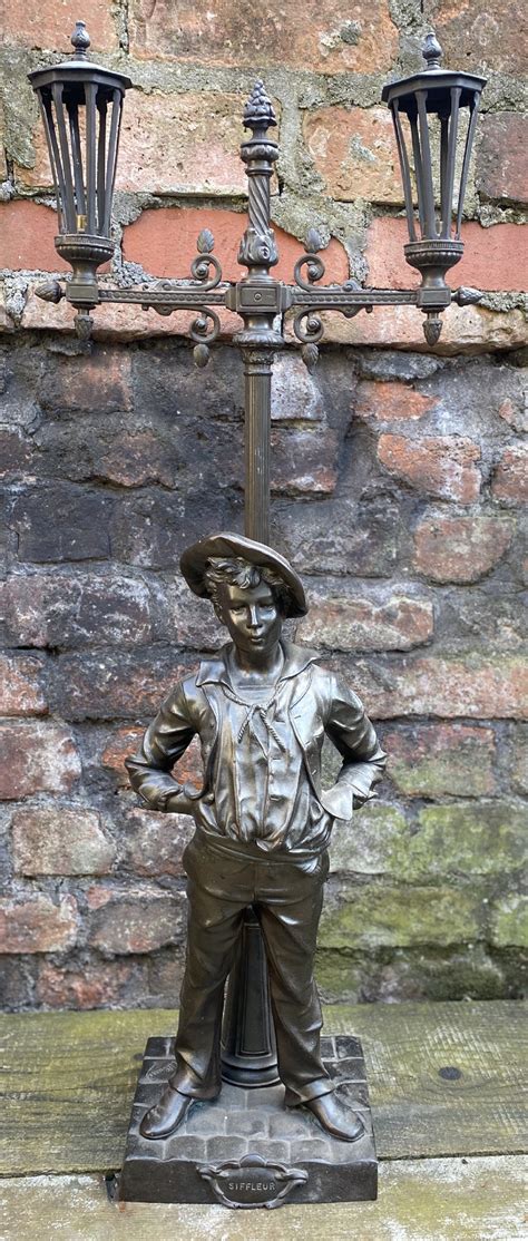 C19th Table Lamp Modelled As A Whistling Boy Leaning Against A Lamppost