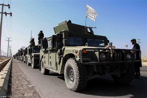 Taliban show off US-made armoured vehicles and weaponry during victory ...