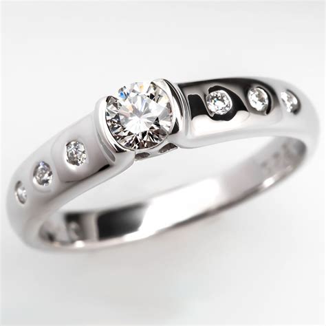 Semi Bezel Set Diamond Engagement Ring 18K White Gold Bezel Set