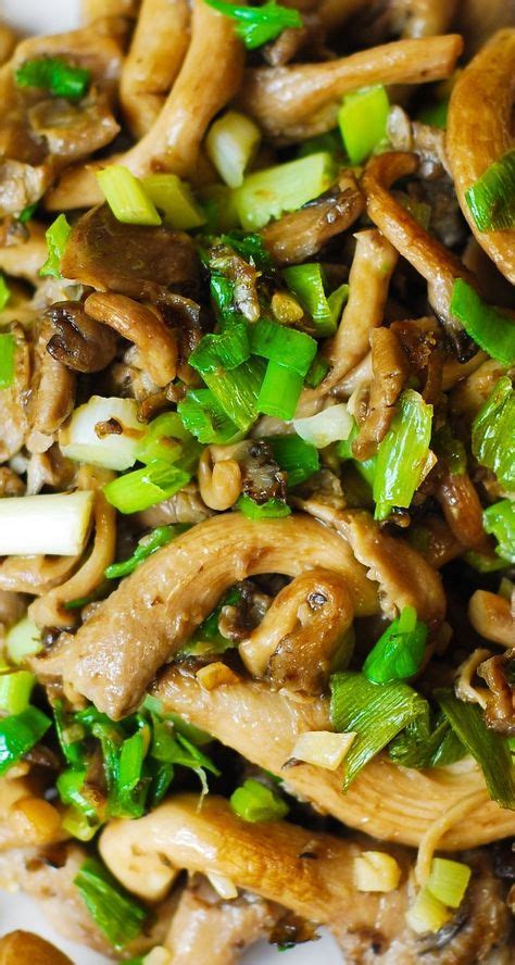 Oyster Mushrooms Sauteed With Garlic And Topped With Green Onions