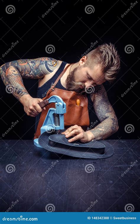 Professional Leather Worker Being Keen On His Buisness In The Tanner