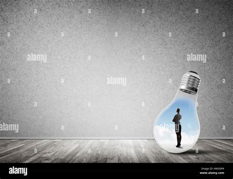Businesswoman Trapped In Bulb Stock Photo Alamy