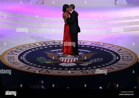 United States President Barack Obama R Dances With First Lady