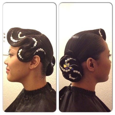 Low Swirl Bun Decorated With Pearls The Large Bang Swoop Makes This A