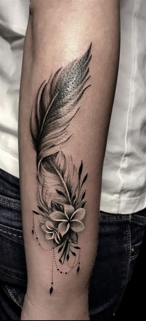 Feather Tattoo On Forearm