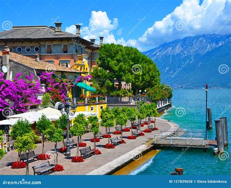 Beautiful Spring View of Limone Sul Garda, Promenade in Flowers. Limone Sul Garda, Famous Region ...