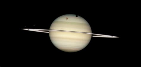 Quadruple Saturn Moon Transit Hubblesite