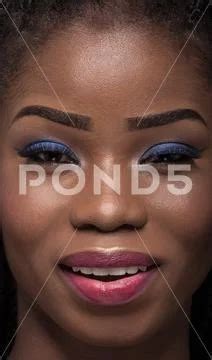 Photograph Close Up Portrait Of Smiling Dark Skinned Model 76122792