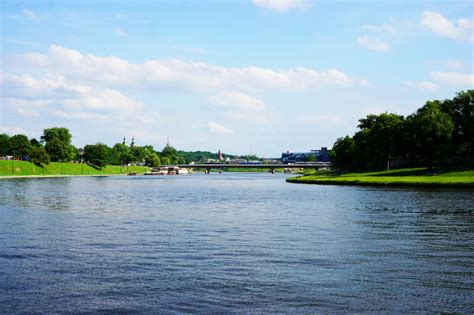 Walking Along The Vistula River In Krakow And Art On A Bridge