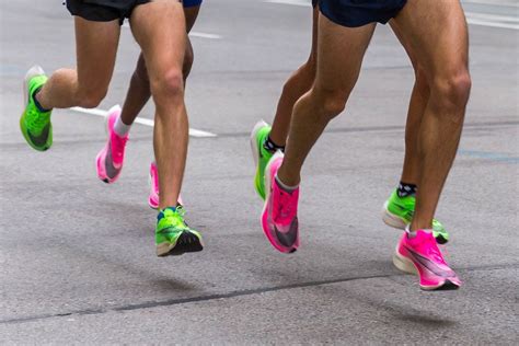 Legs Of Marathon Runners Wearing Nike Zoomx Vaporfly Next Running