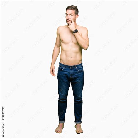 Handsome Shirtless Man Showing Nude Chest Pointing To The Eye Watching You Gesture Suspicious