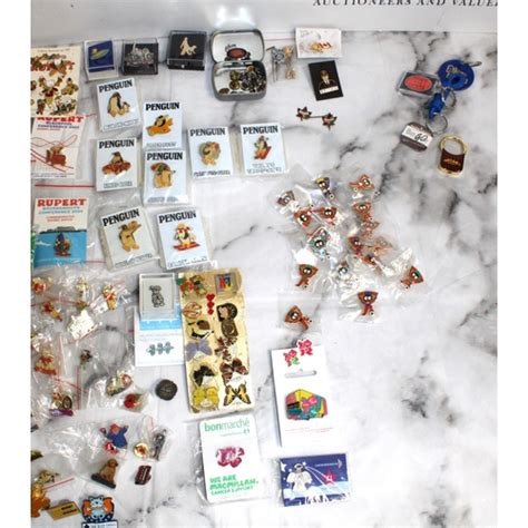 A Quantity Of Collectable Pin Badges And Other