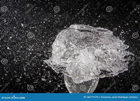 Balloon Full Of Water Exploding Stock Photo Image Of Broken