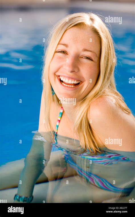 A Young Woman In A Swimming Pool Stock Photo Alamy