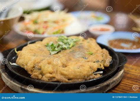 Oyster Omelette Or Thai Style Fried Mussels In A Hot Pan Stock Photo