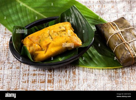 Tamale Typical Colombian Food Wrapped In Banana Leaves Stock Photo Alamy