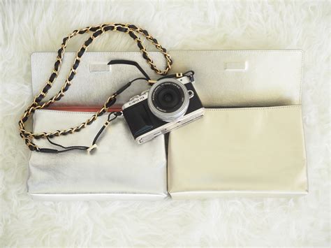 Olympus PEN E-PL7 camera accessories - Clutches and shoulder straps ...