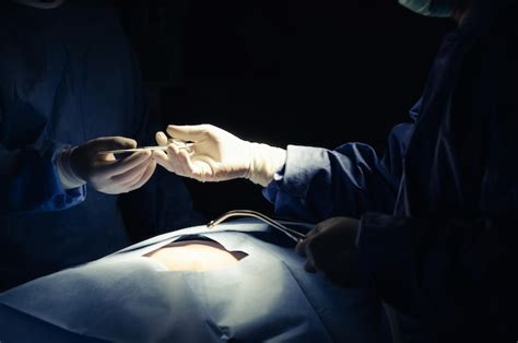 Premium Photo Surgeons Performing Surgery In Operating Room