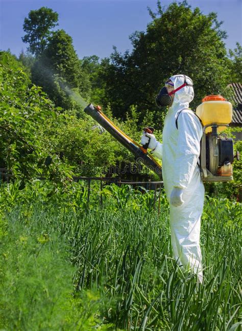 Country Farmer Spraying Insecticide Stock Photo Image