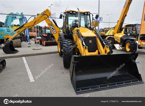 JCB Heavy Duty Equipment Vehicle And Logo Stock Editorial Photo