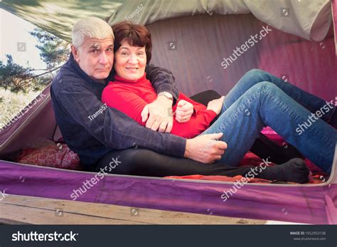 Beautiful Mature Couple Relaxing Tent Embracing Stock Photo 1952953138