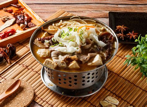 Stinky Lamb hot pot stew with red chili isolated on mat side view of japanese food 有線寬頻 i CABLE