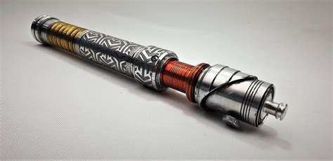 Scratch made lightsaber, with emblems from the Tojo clan from the ...