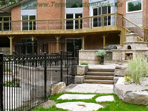 Flagstone Landscaping And 2nd Level Deck Toronto Custom Deck Design Pergolas Fences Outdoor