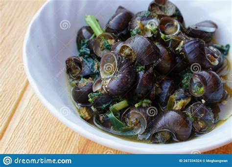 Kaeng Hoi Khom River Snails Or Periwinkle Curry On White Bowl Stock