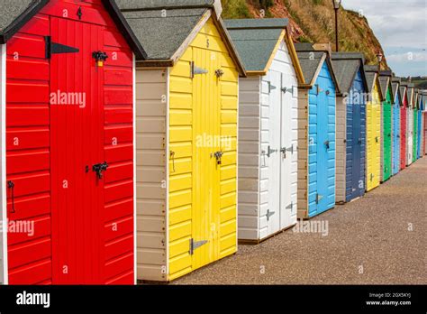 A Row Of Beach Huts On The Dorset Coast Of England Stock Photo Alamy