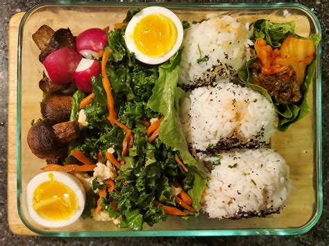 My First Try At A Bento Tuna Onigiri Kale Slaw Sauteed Mushrooms