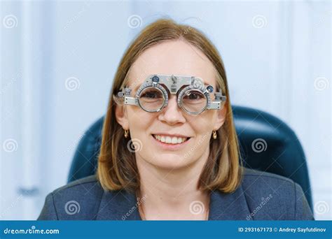 Middle Aged Woman Wearing Glasses For Eye Exam In Ophthalmologist S Office Stock Image Image