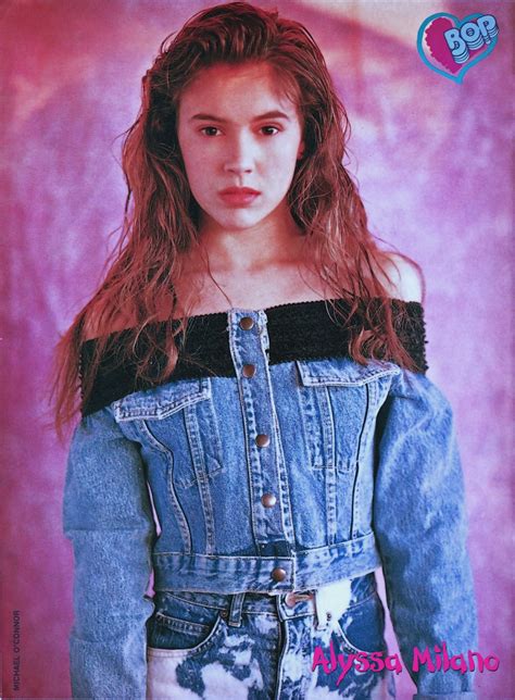 Pinup Of Alyssa Milano Wearing A Blue Denim Jacket And Denim Jeans From