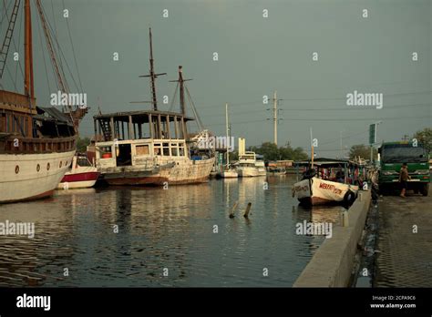 Old Canal And Phinisi Ships At The Area Of Port Of Tanjung Emas Port In