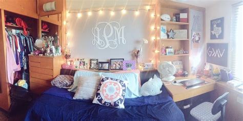 A Dorm Room With Lights Strung From The Ceiling