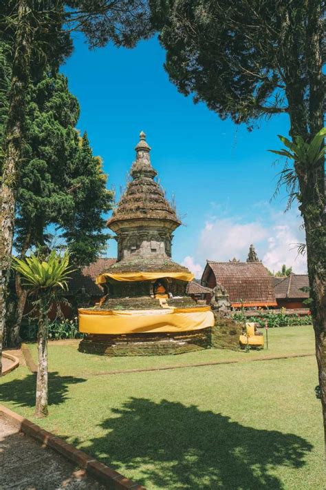 The Beautiful Nungnung Waterfall In Bali And Ulun Danu Bratan Temple