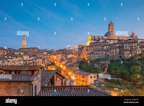 Downtown Siena Skyline In Italy At Twilight Stock Photo Alamy