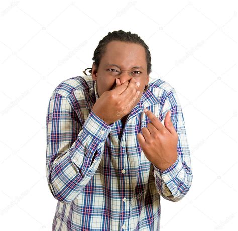 Man Pinches His Nose Looks At You Something Stinks Stock Photo By