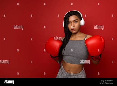 Fitness young African woman boxer with fit body preparing for boxing ...