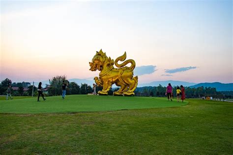 Premium Photo A Beautiful View Of Golden Singha Statue In Singha Park