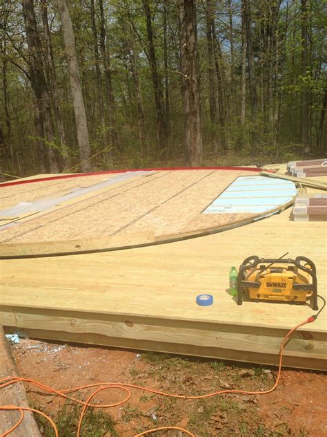 Painting The Yurt Floor Frame Red Geodesic Dome Homes Earthship Home