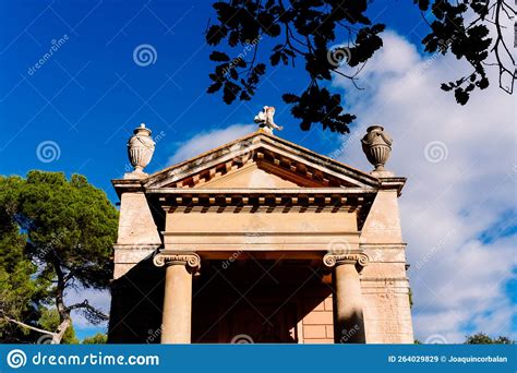 A Portico With Columns And A Triangular Pediment On The Greek Style