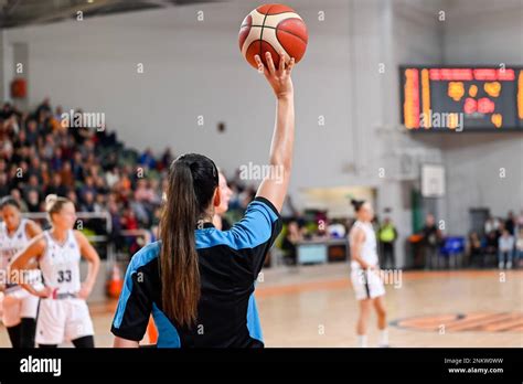 Woman Referee Keeps The Ball During Basketball Match Stock Photo Alamy